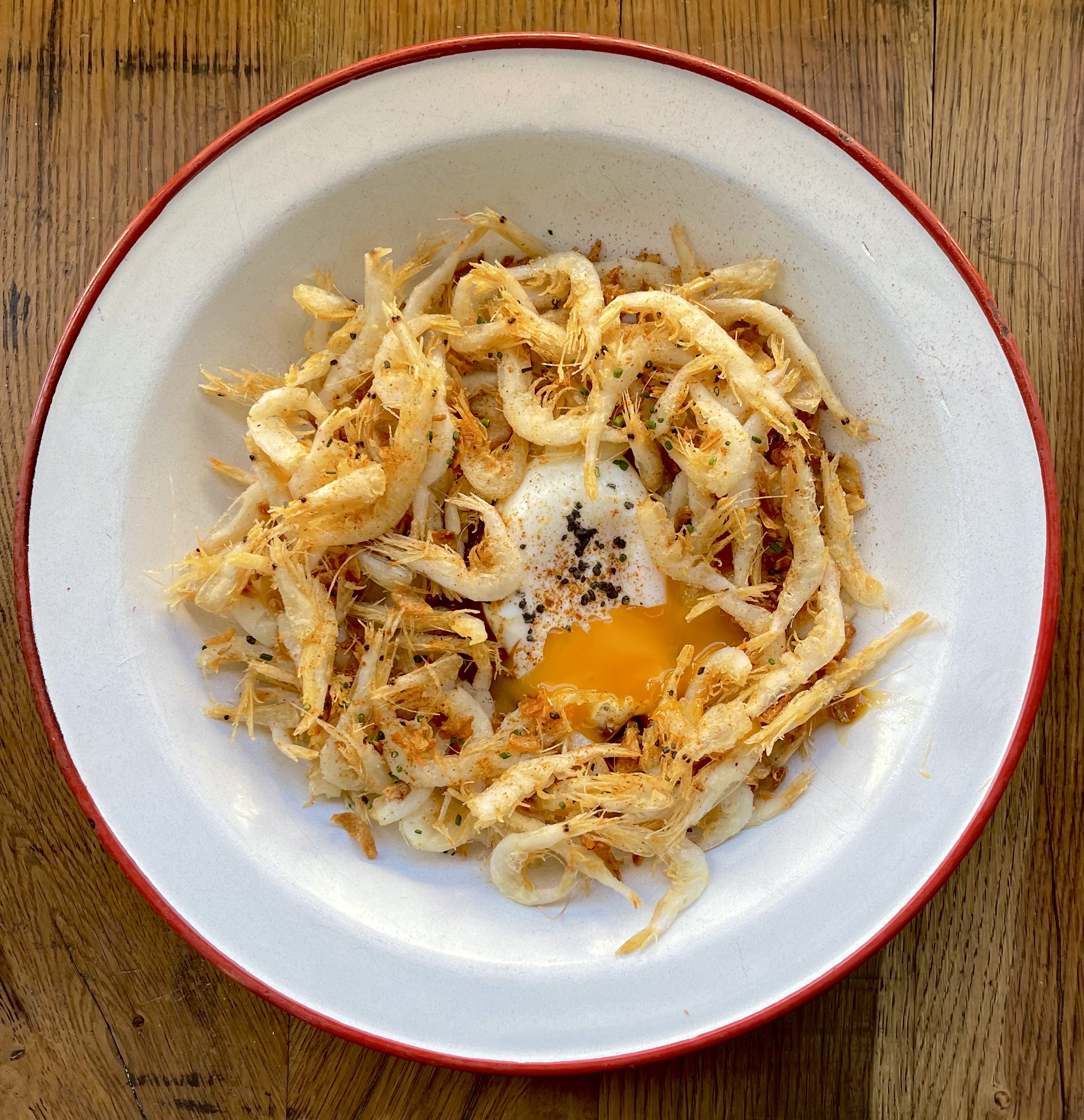Fried baby squid with onion and egg