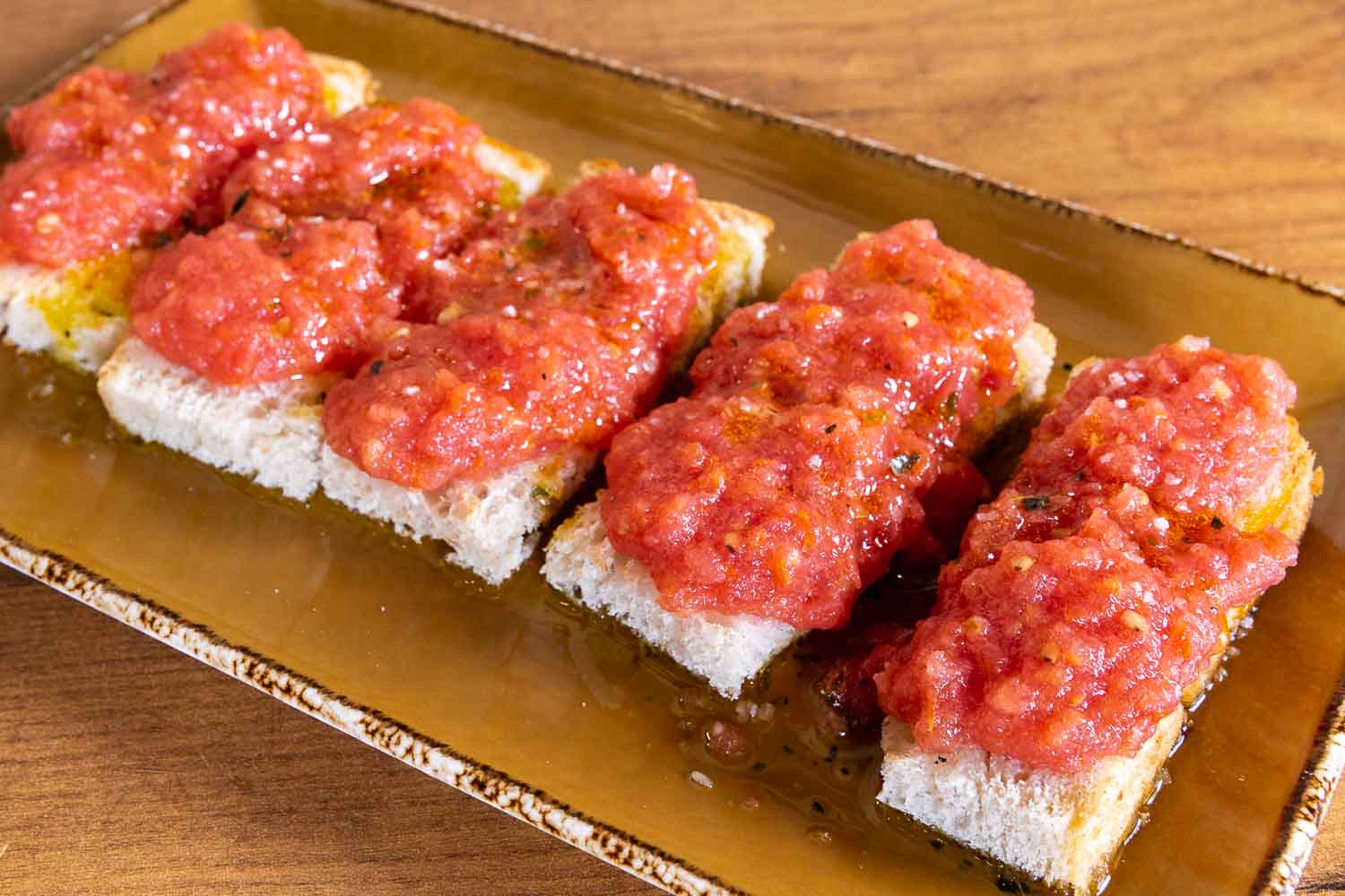 Bread with tomato and virgin olive oil