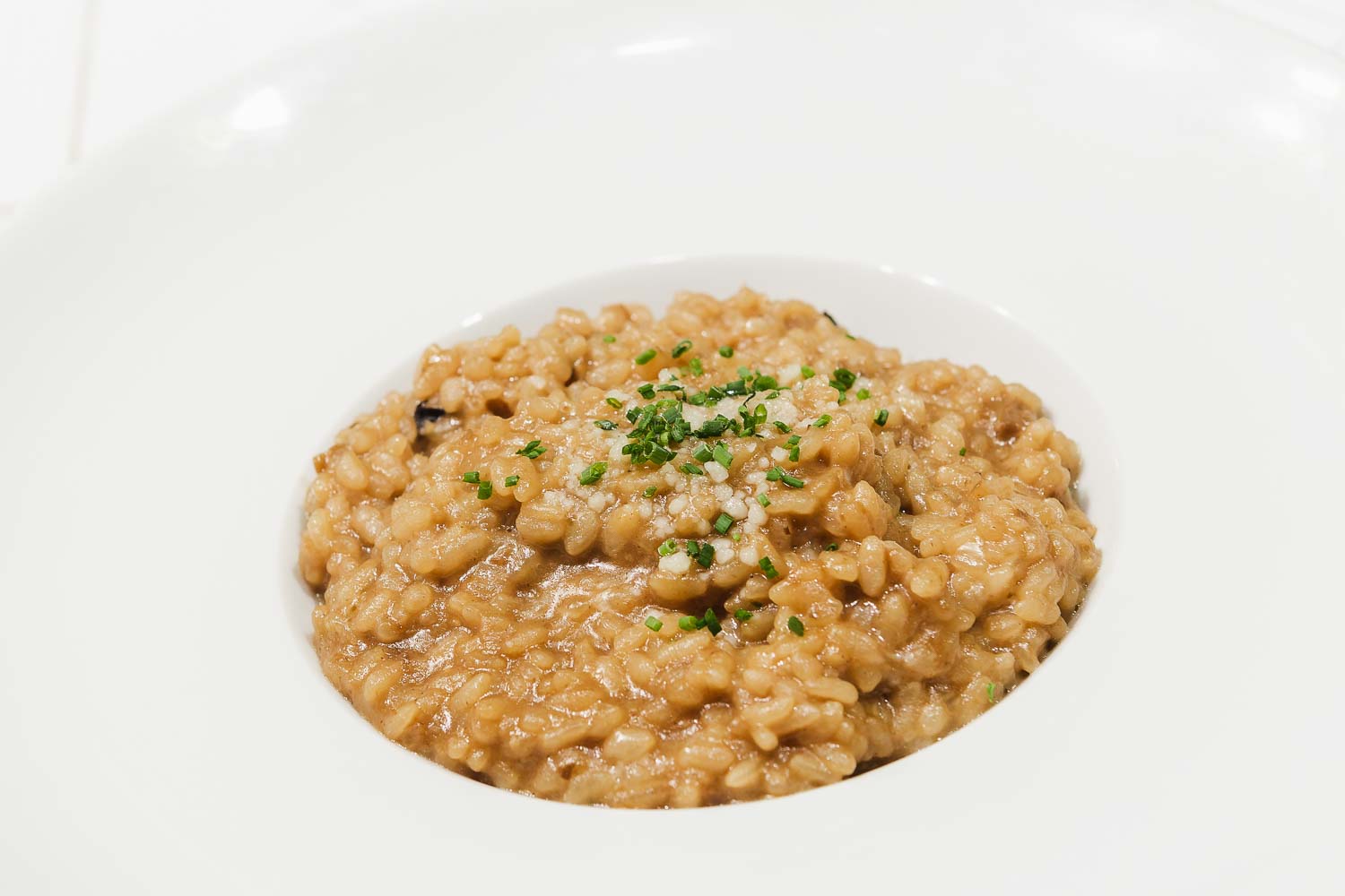 Risotto of boletus and black trumpet mushrooms with truffle oil 