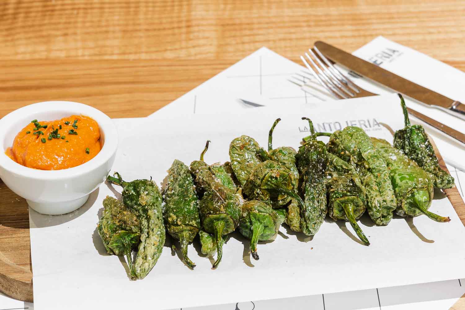 Padron peppers with romescu sauce