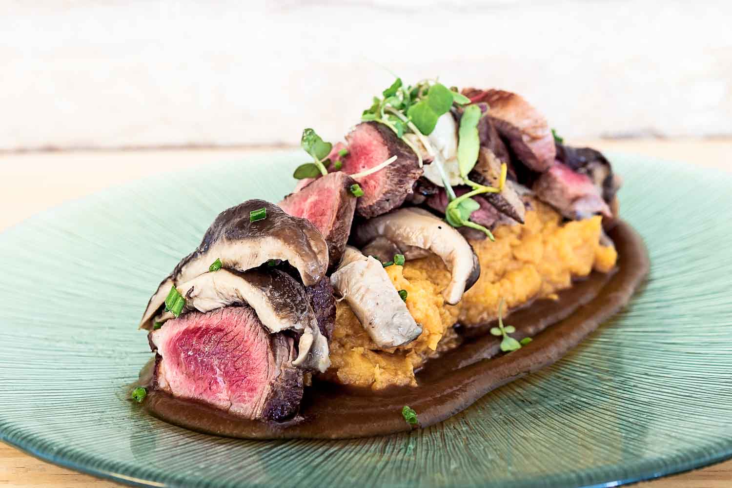 Duck with mashed potatoes and mushrooms