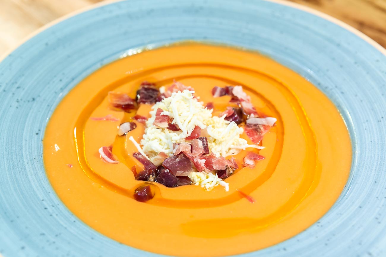 Salmorejo (cold sauce vegetables and tomatoes) with chunks of ham and egg