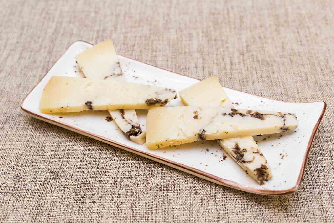 Pecorino cheese with black truffle