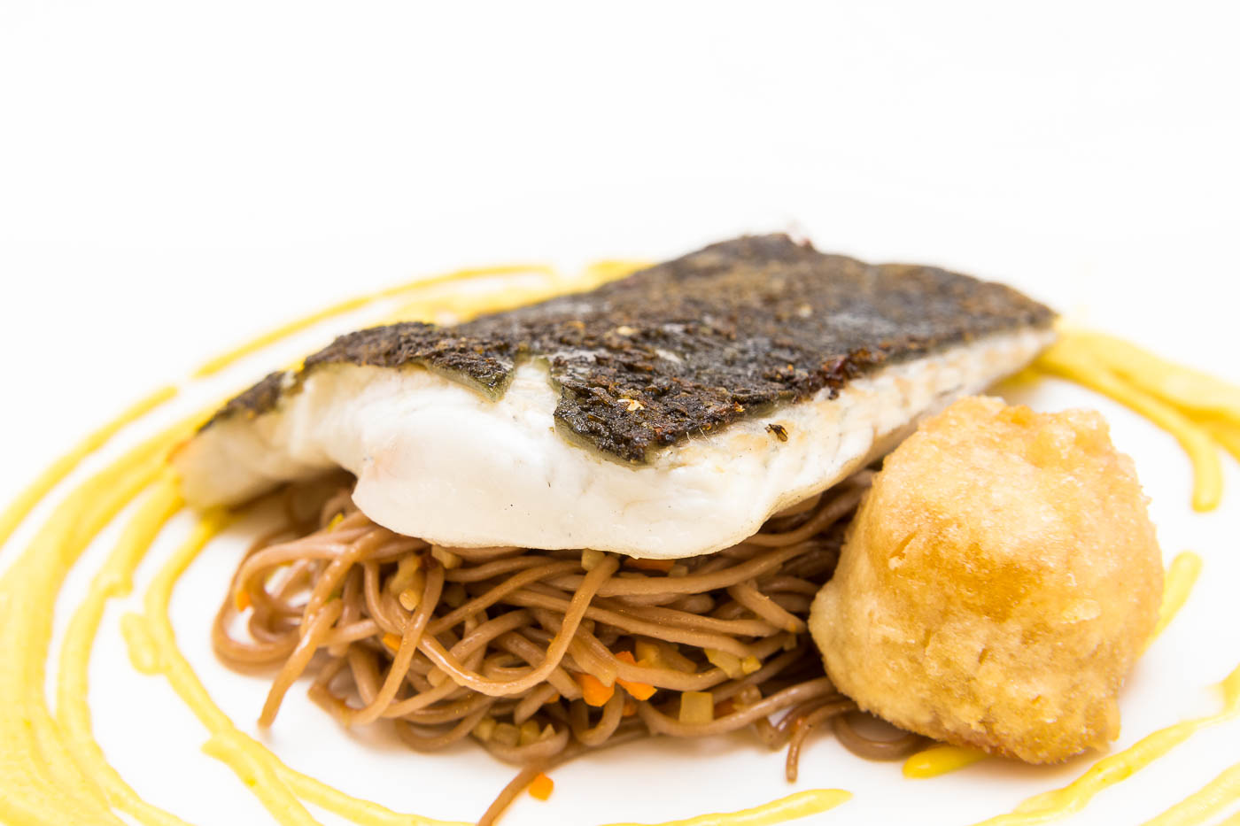 Grilled turbot, saffron alioli, noodles with amontillado wine and lobster fritters