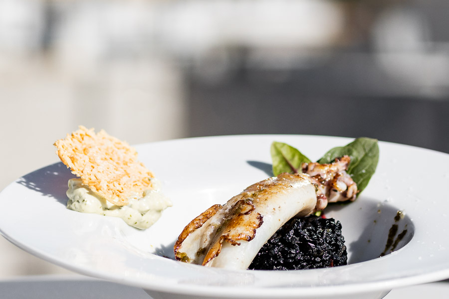 Black rice with squid, garlic and parmesan cheese