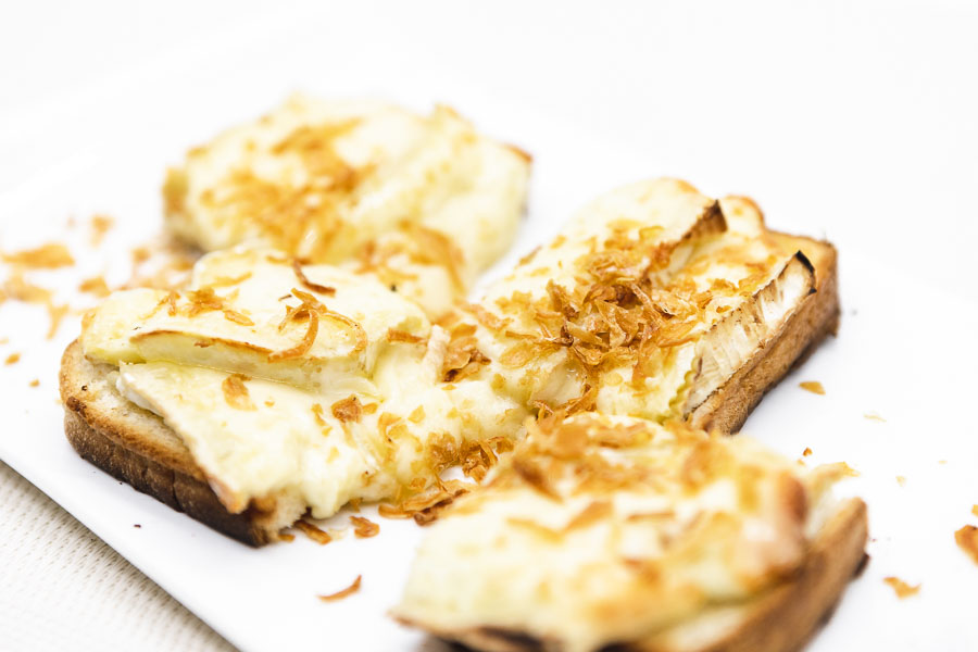 Baked bread with camembert cheese and onion