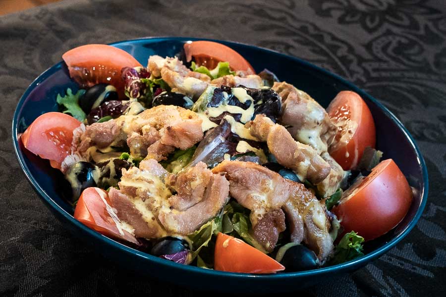 Green Salad with Tomatoes, Chicken, Black Olives and Cheese