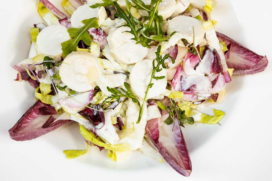 White, red endive Salad with palm and Roquefort cheese 