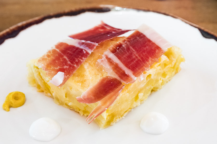 Spanish potato omelet with cameralized onion and iberian ham 
