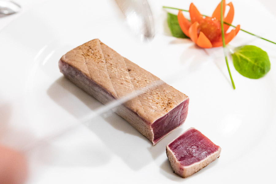 Bluefin tuna seasoned and prepared on the table