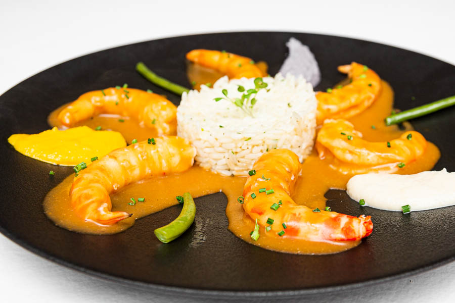 King prawns with lobster sauce flambé with cognac and Madeira wine