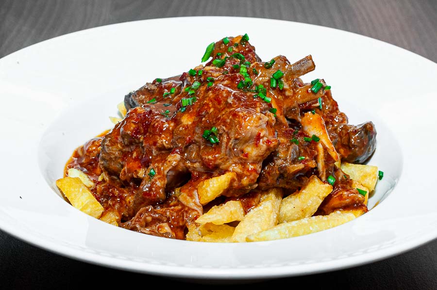 Goat stew with fries