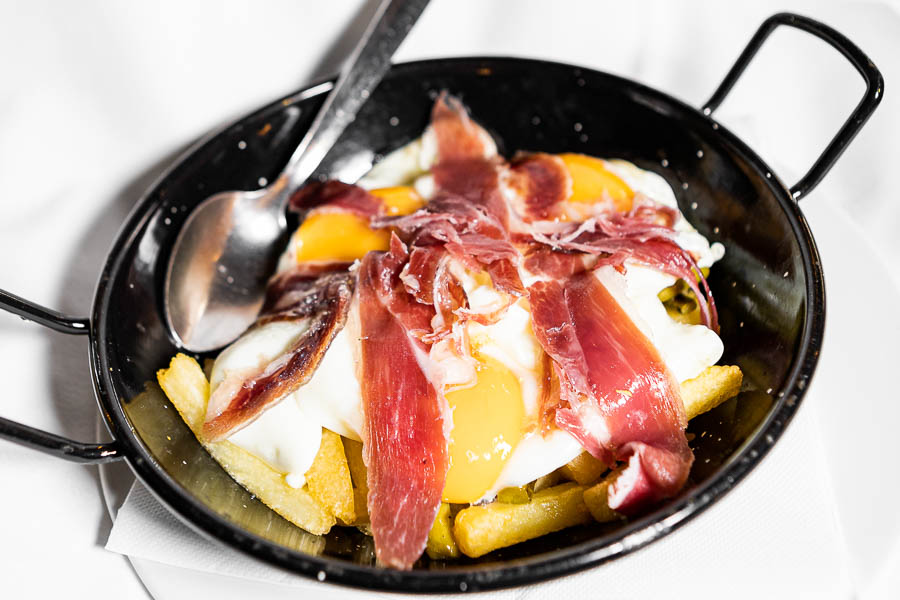 Scrambled eggs with Iberian ham and potato