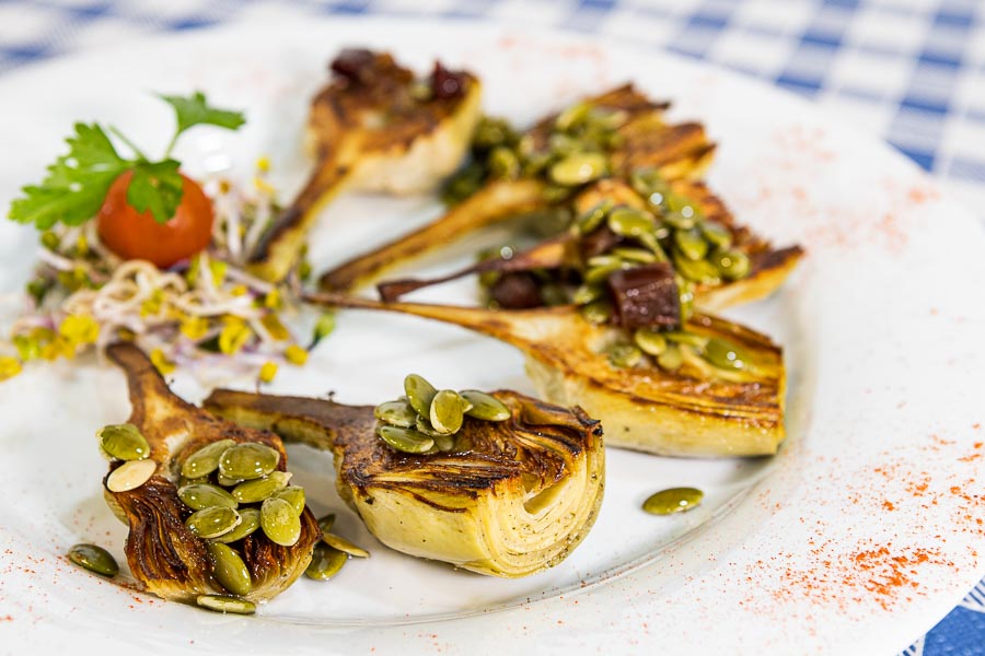 Grilled artichokes with pumpkin seeds