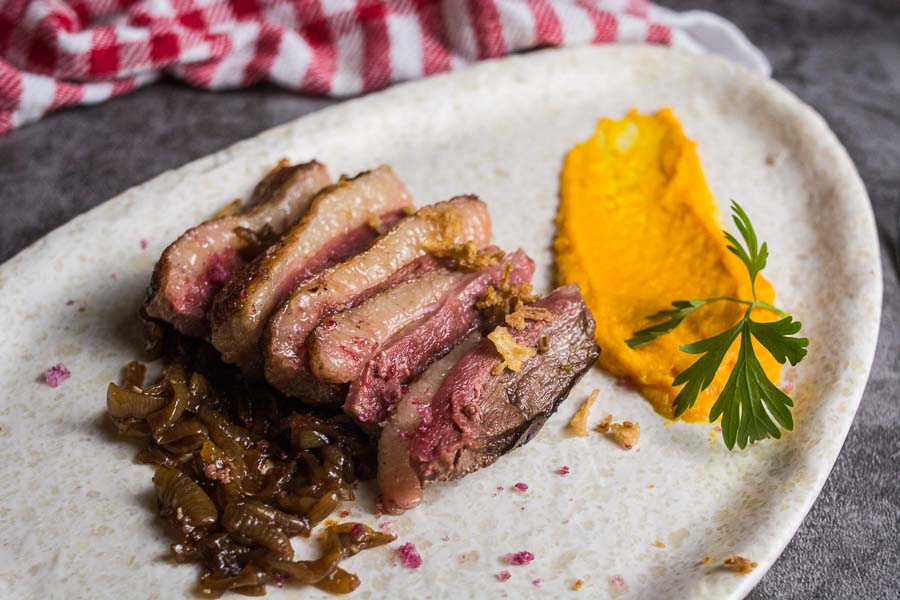 Duck breast with onion and orange sauce