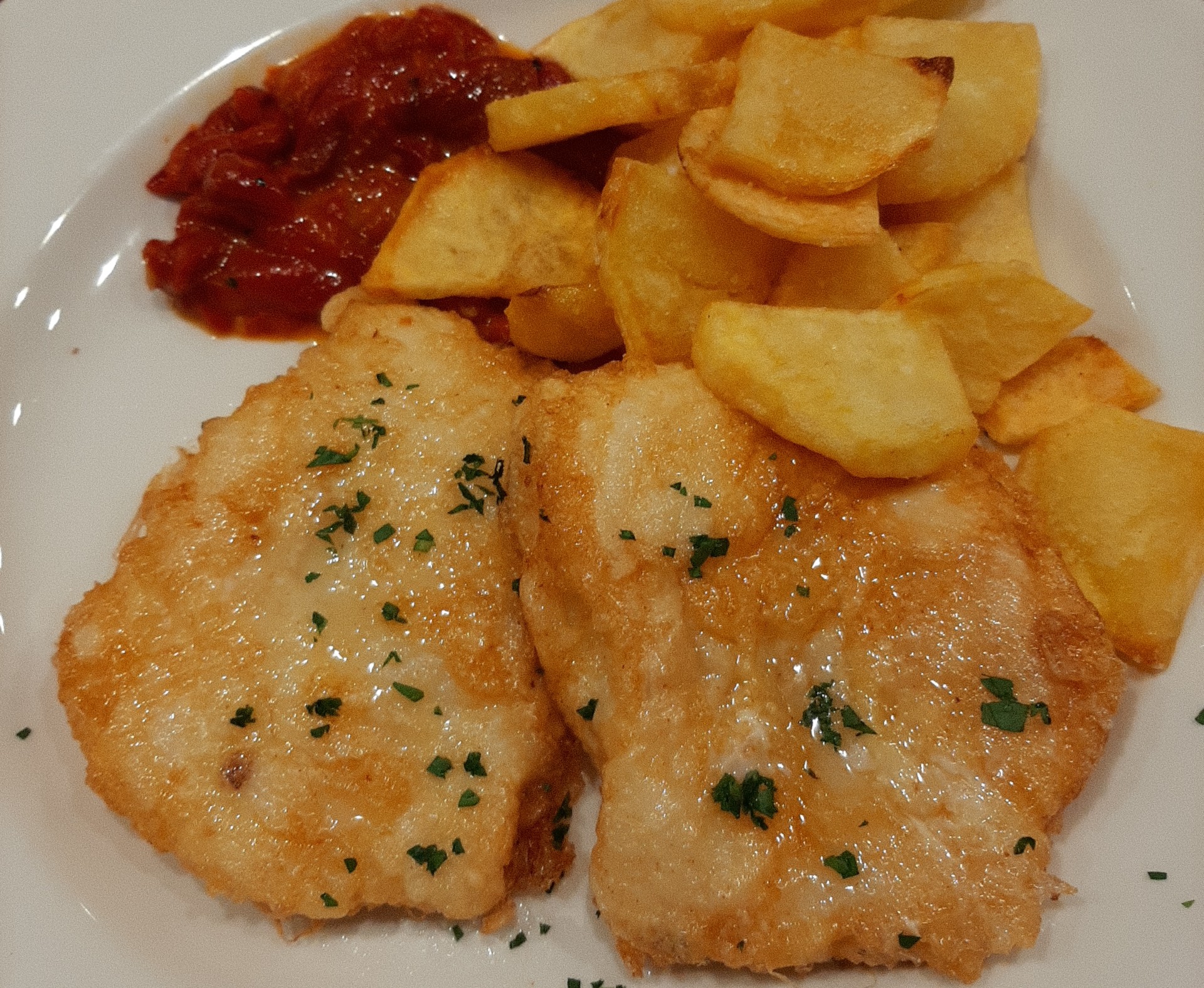 Breaded codfish with peppers