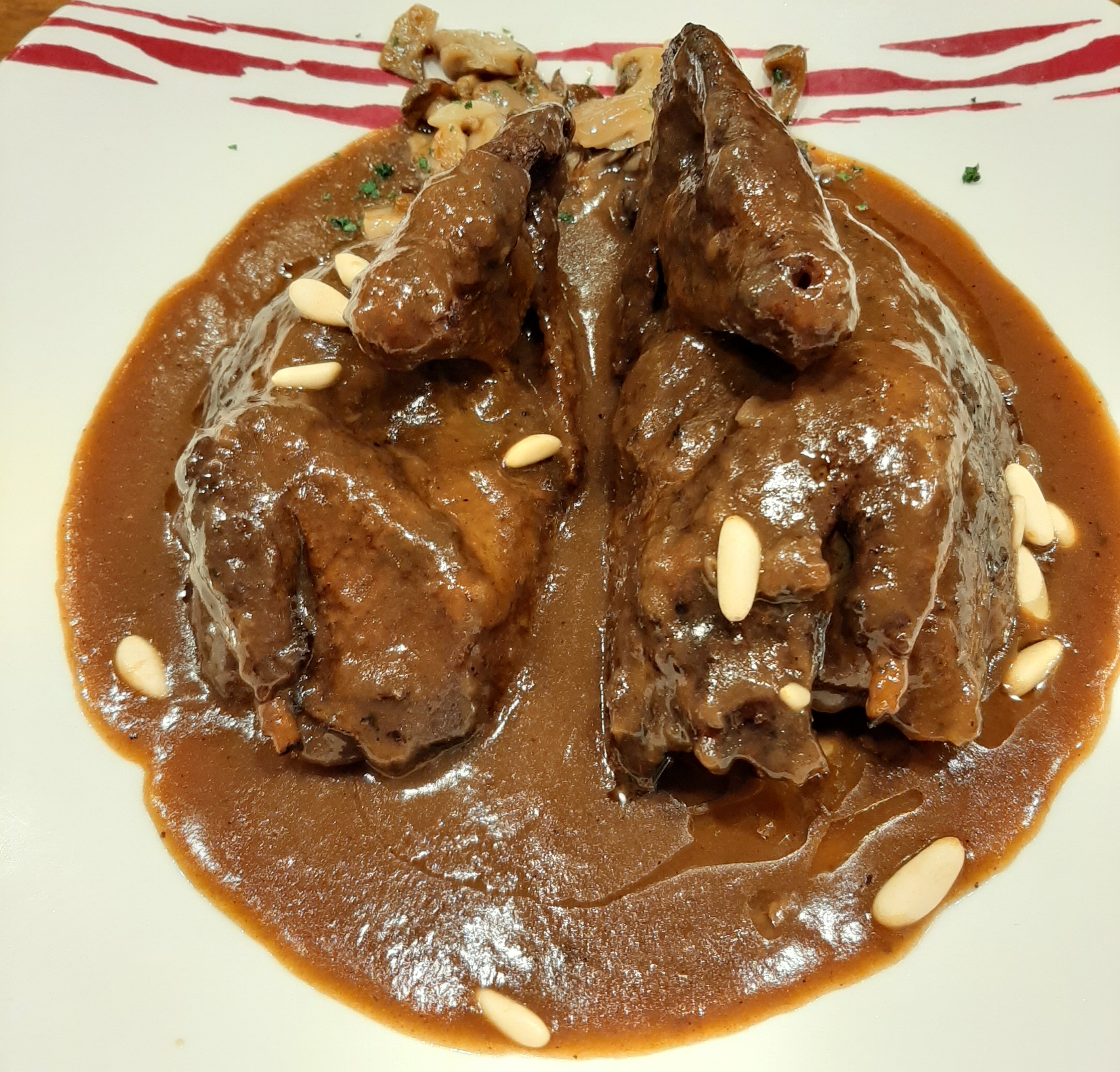 Roasted squab pigeon with mushroom and chasseur sauce 
