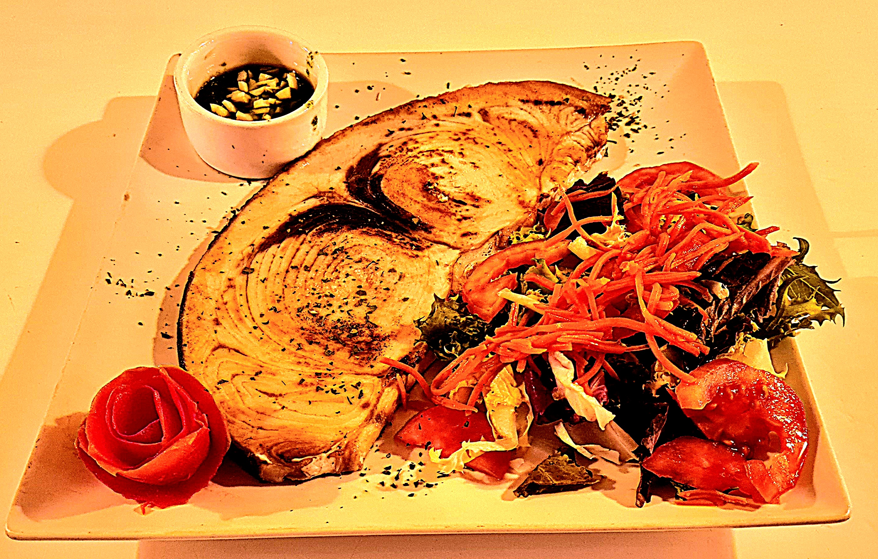 Grilled swordfish in green sauce