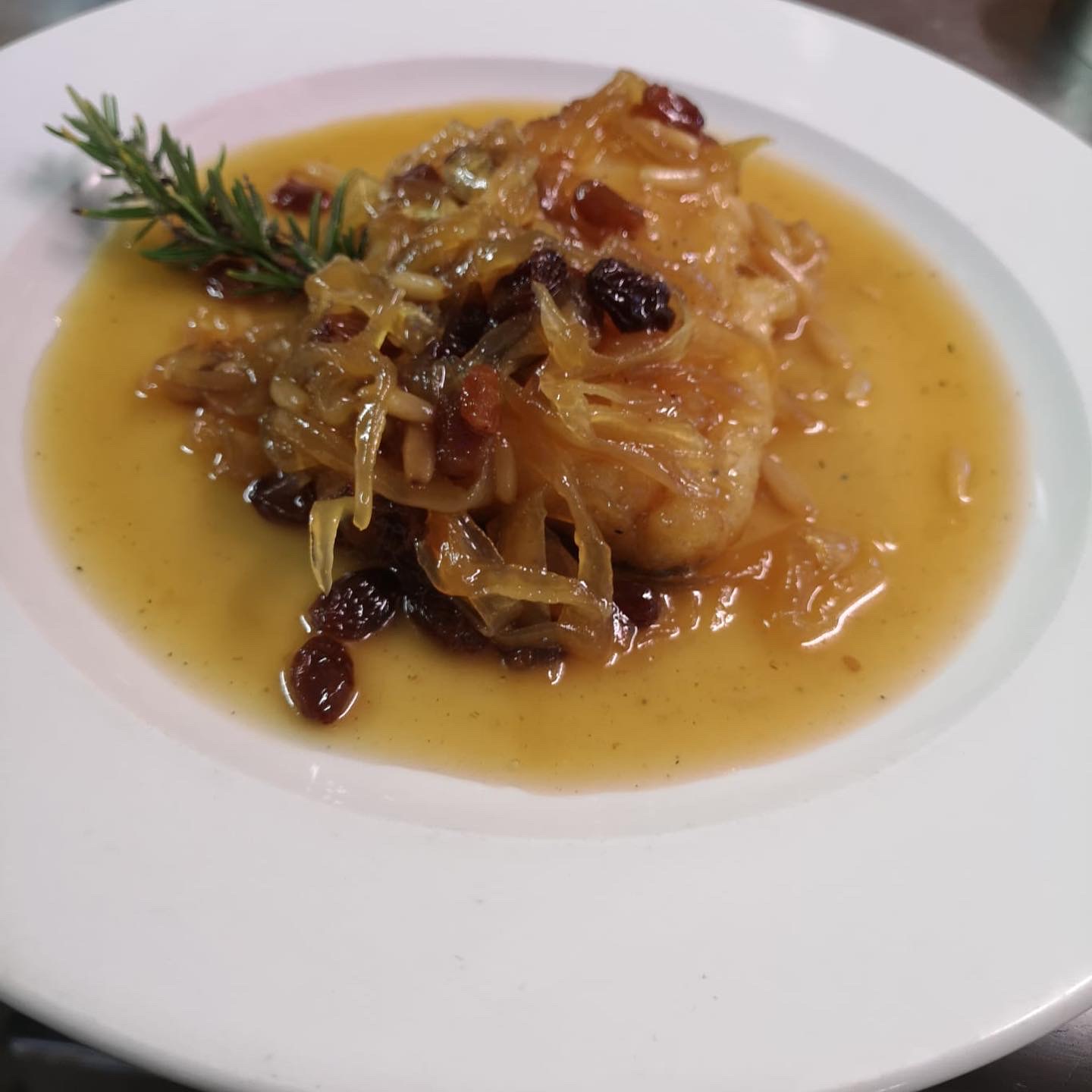 COD LOIN IN HONEY WITH RAISINS AND PINIONS