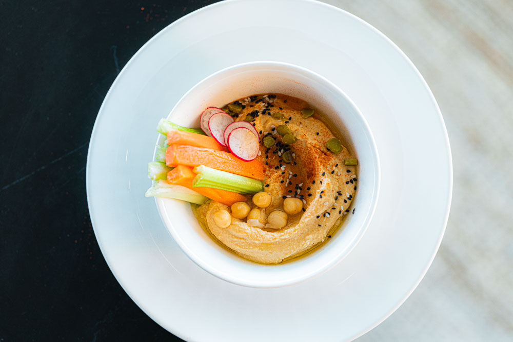 Hummus with pickles and veggie crudités