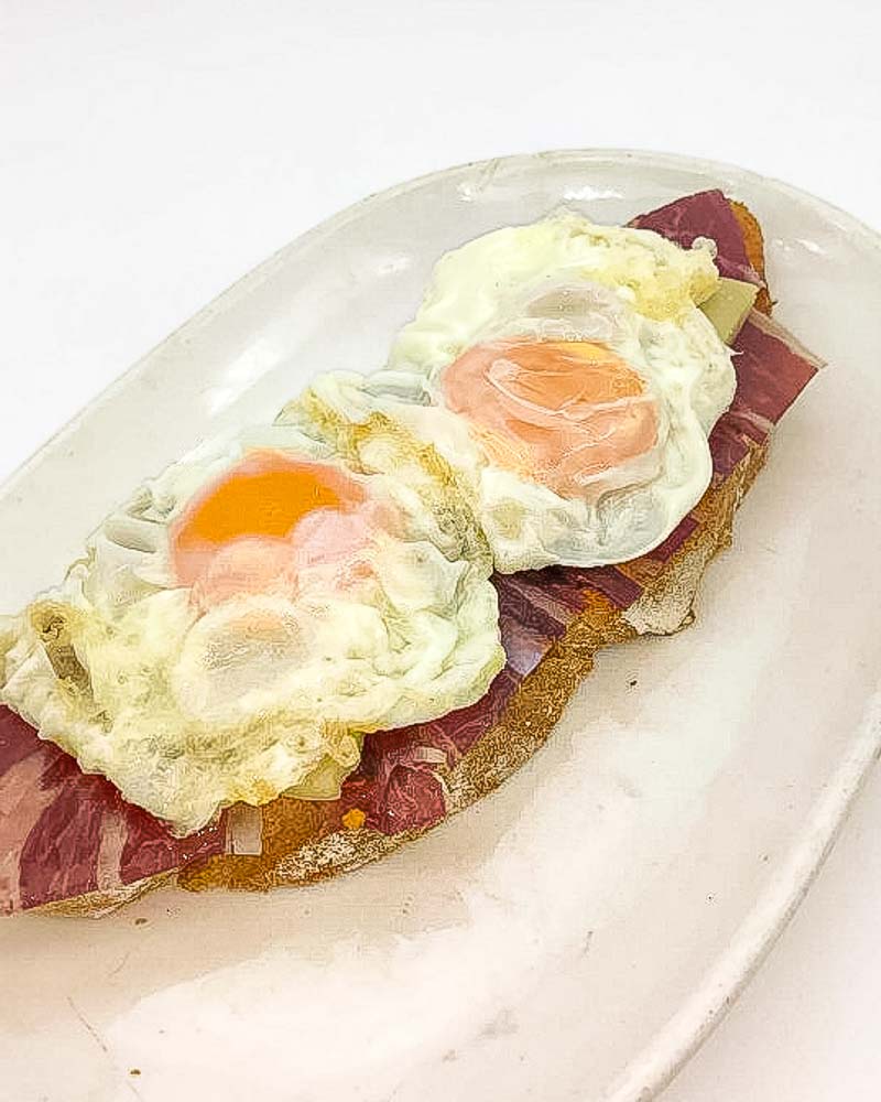 Iberian ham with cheese and fresh fried eggs 