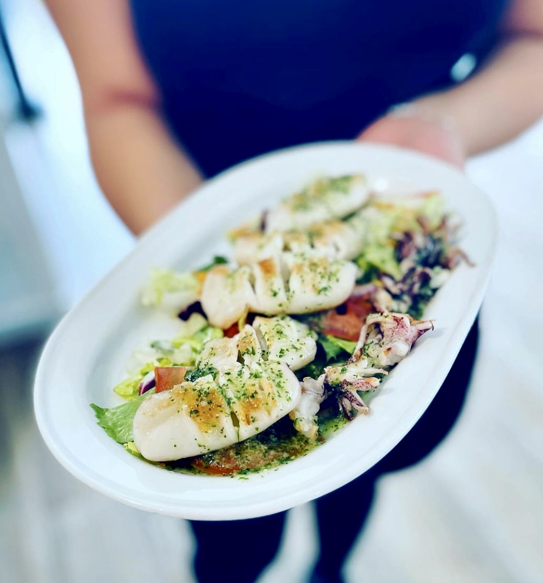 Grilled baby squid with green sauce
