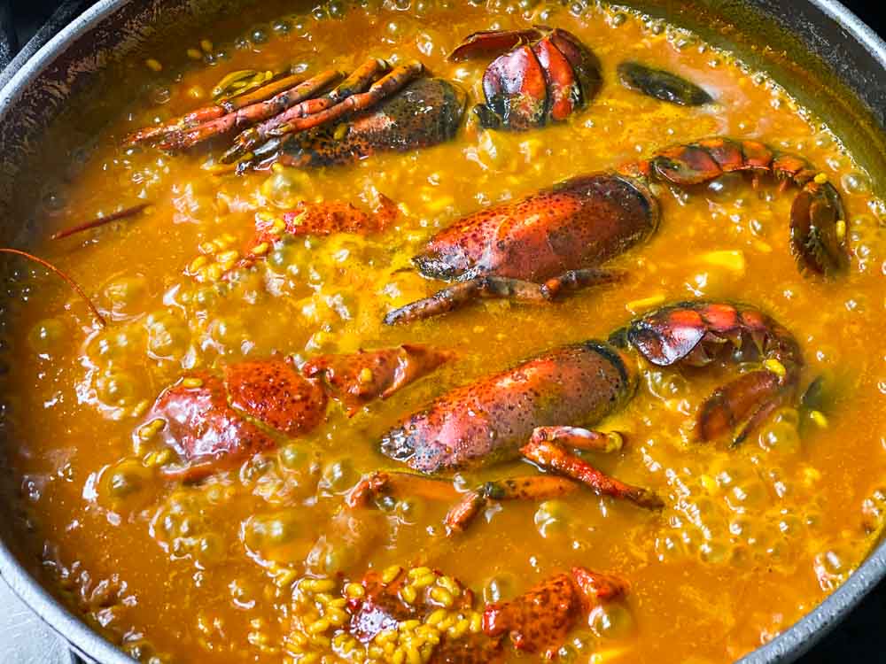 Paella cauldron with lobster