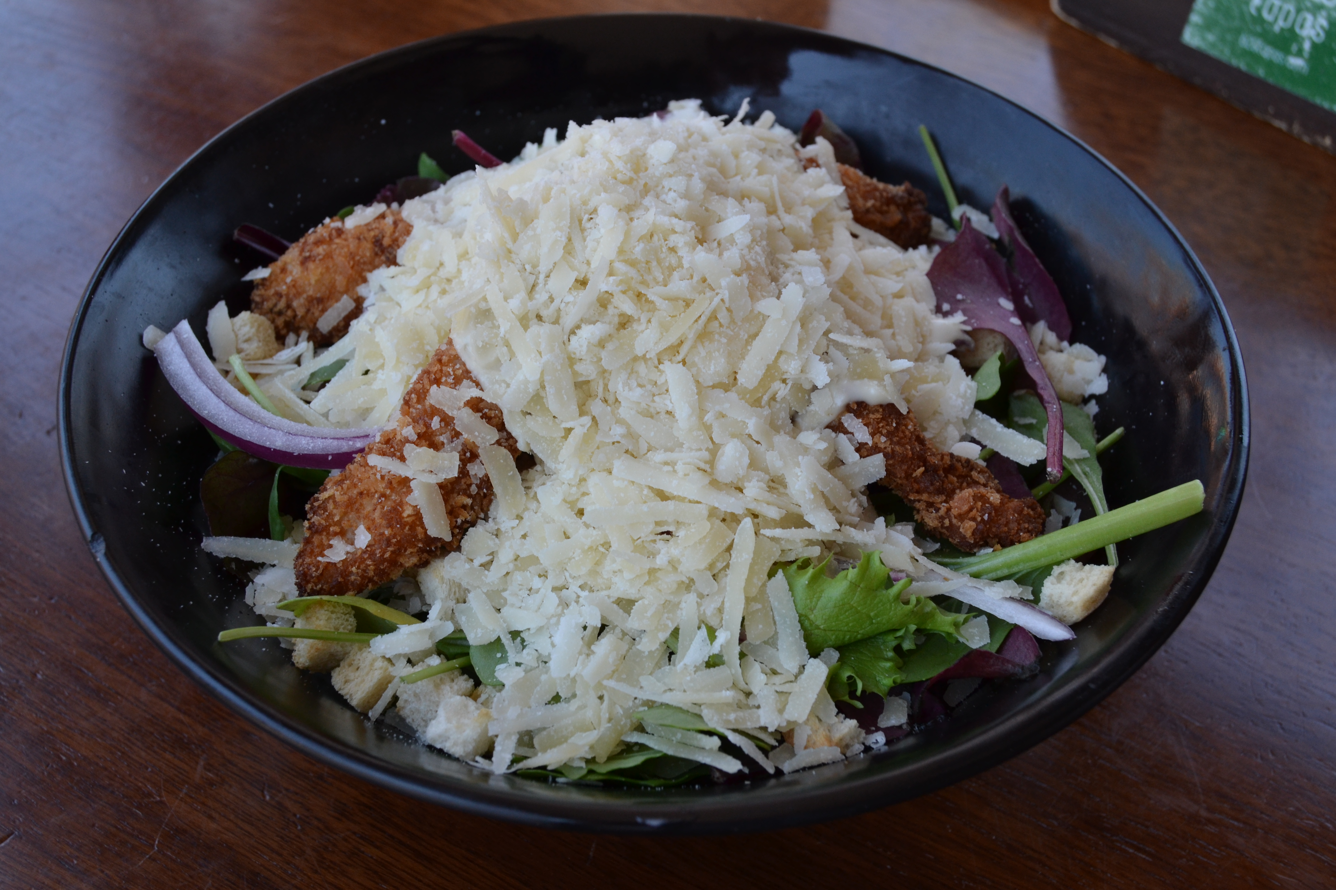 CAESAR SALAD WITH CRISPY CHICKEN AND GRATED PARMESAN