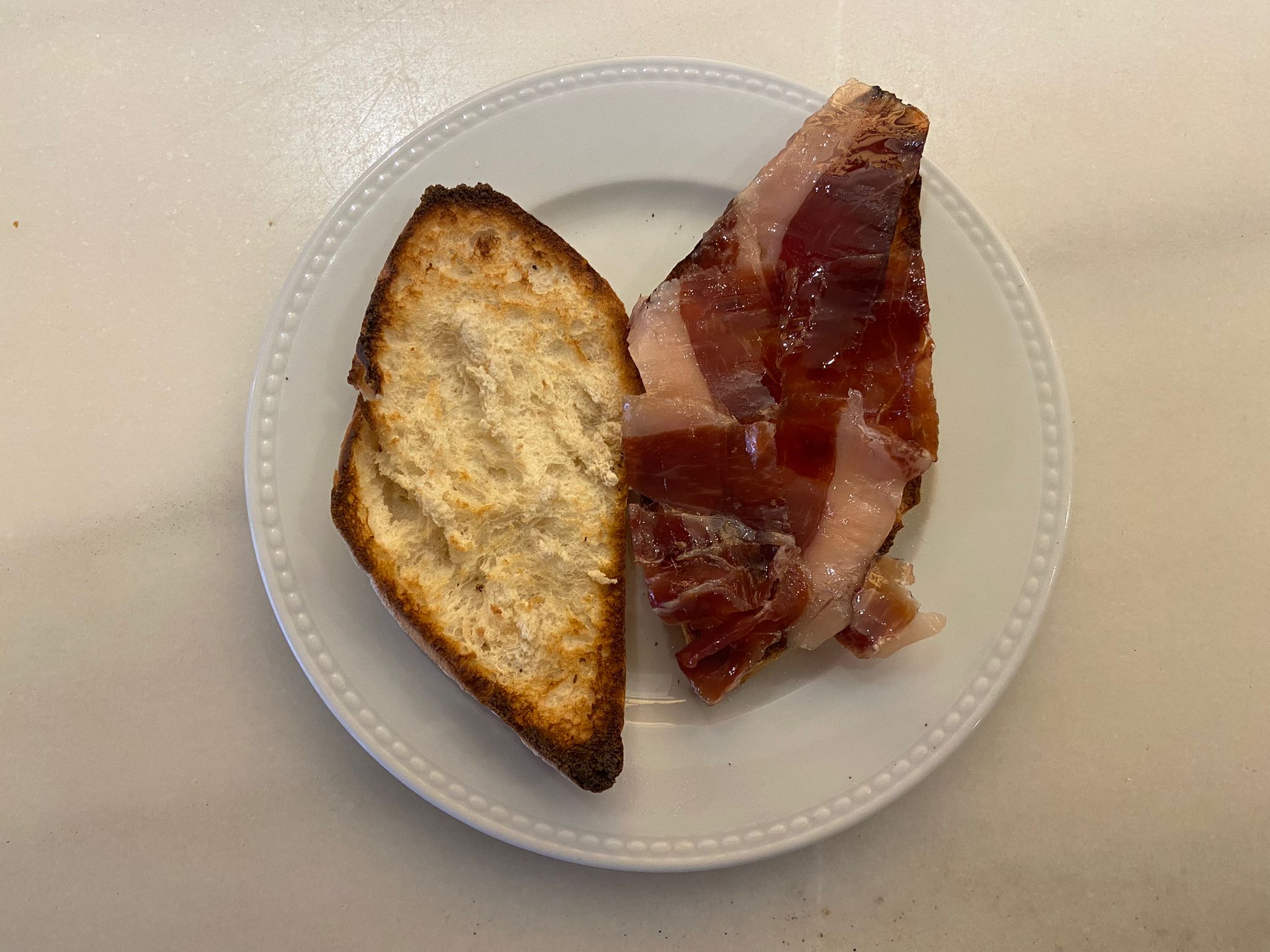 Toast with oil or butter and Iberian ham