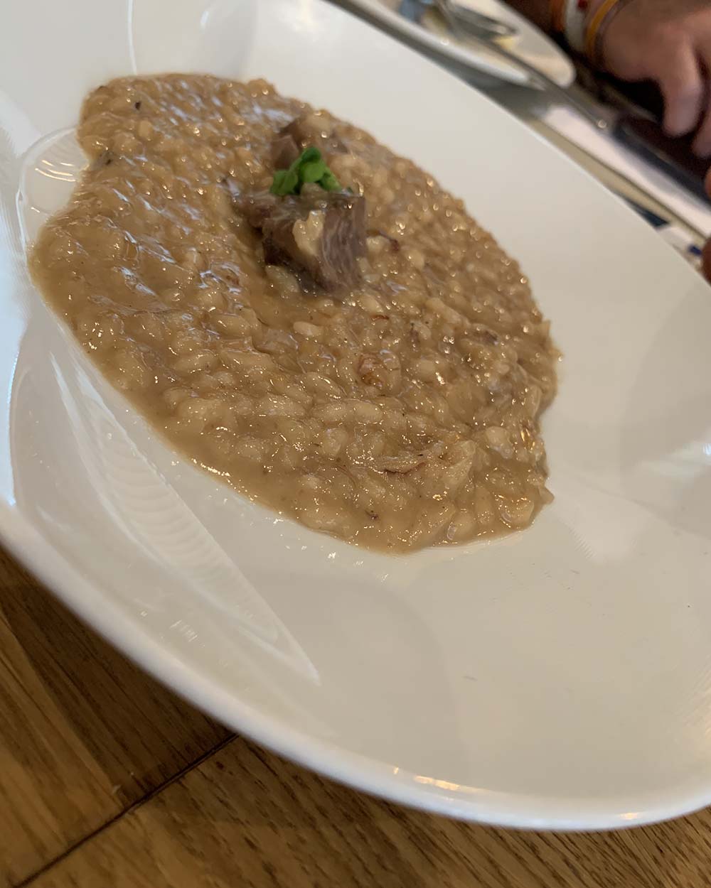 Boletus risotto with duck confit thigh