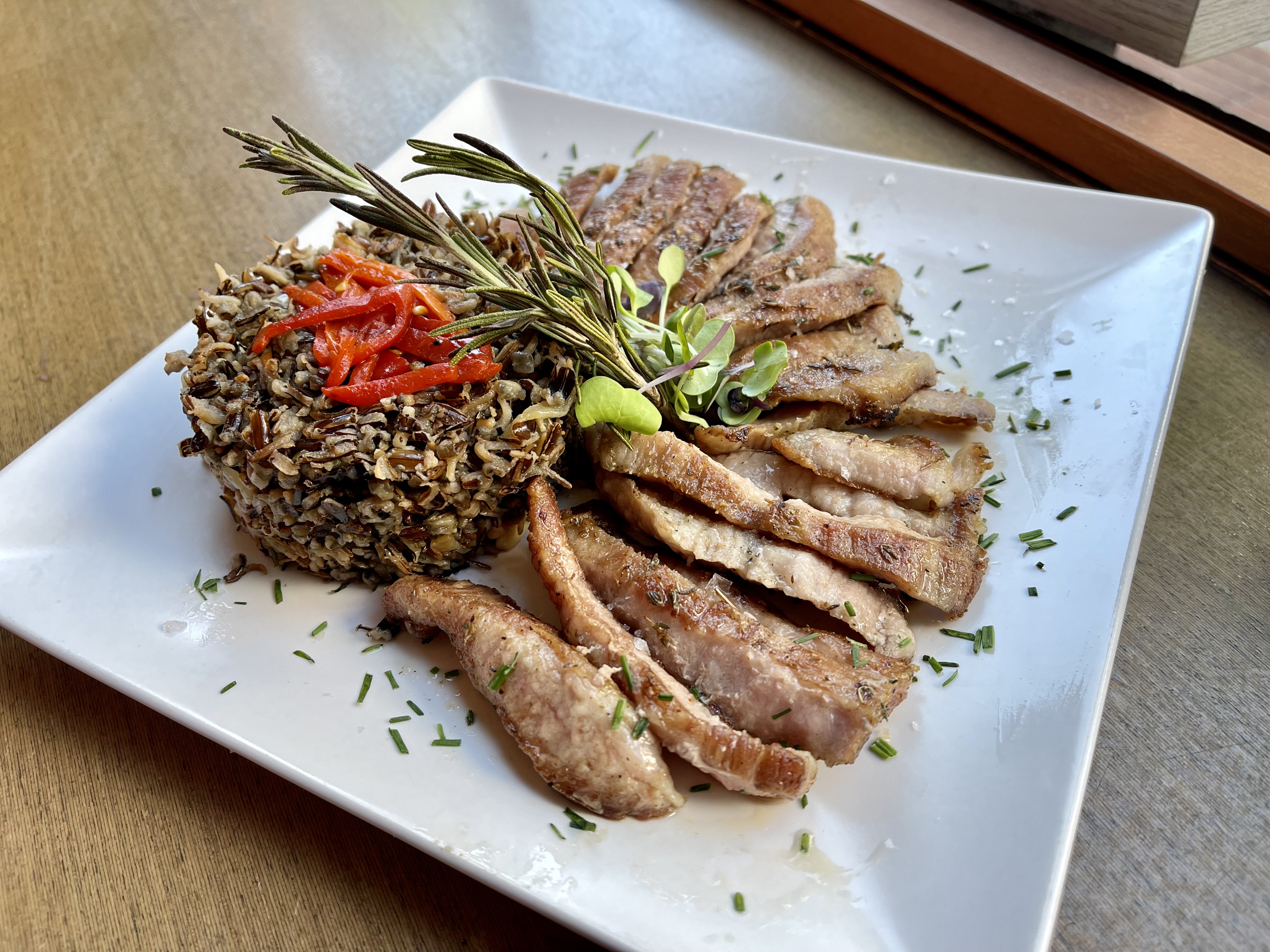 Grilled Iberian secret with wild rice