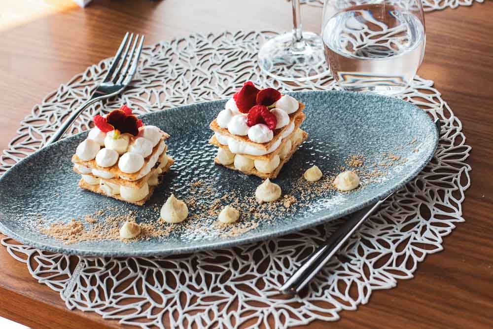 White chocolate, whipped cream and raspberry millefeuille 