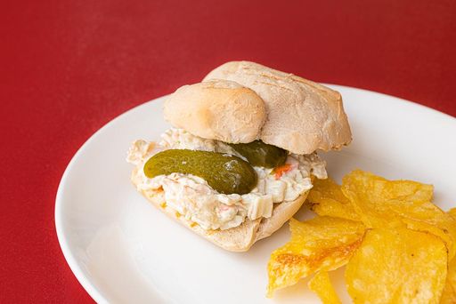 Seafood sandwich with alioli and pickles
