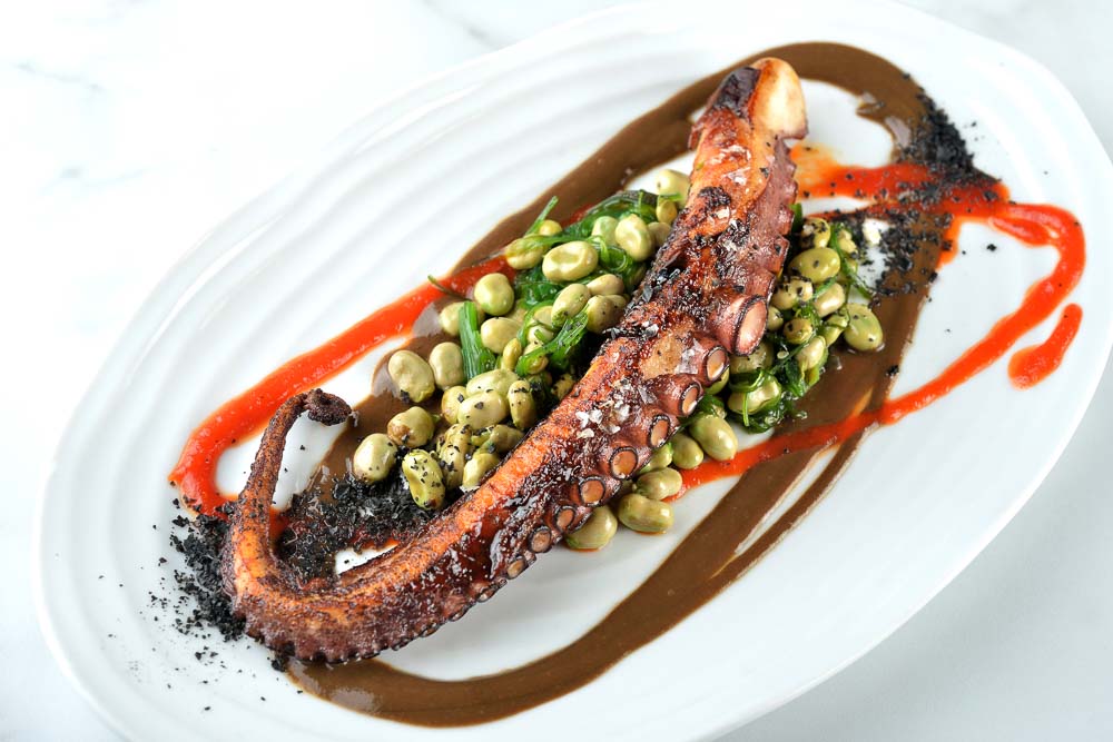 Grilled Octopus With sauteed mukimame beans and black garlic 