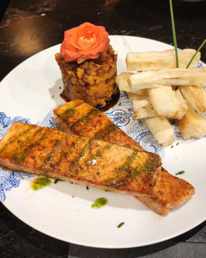 Marinated salmon in ají Panca with mash potatoes and crunchy yuca
