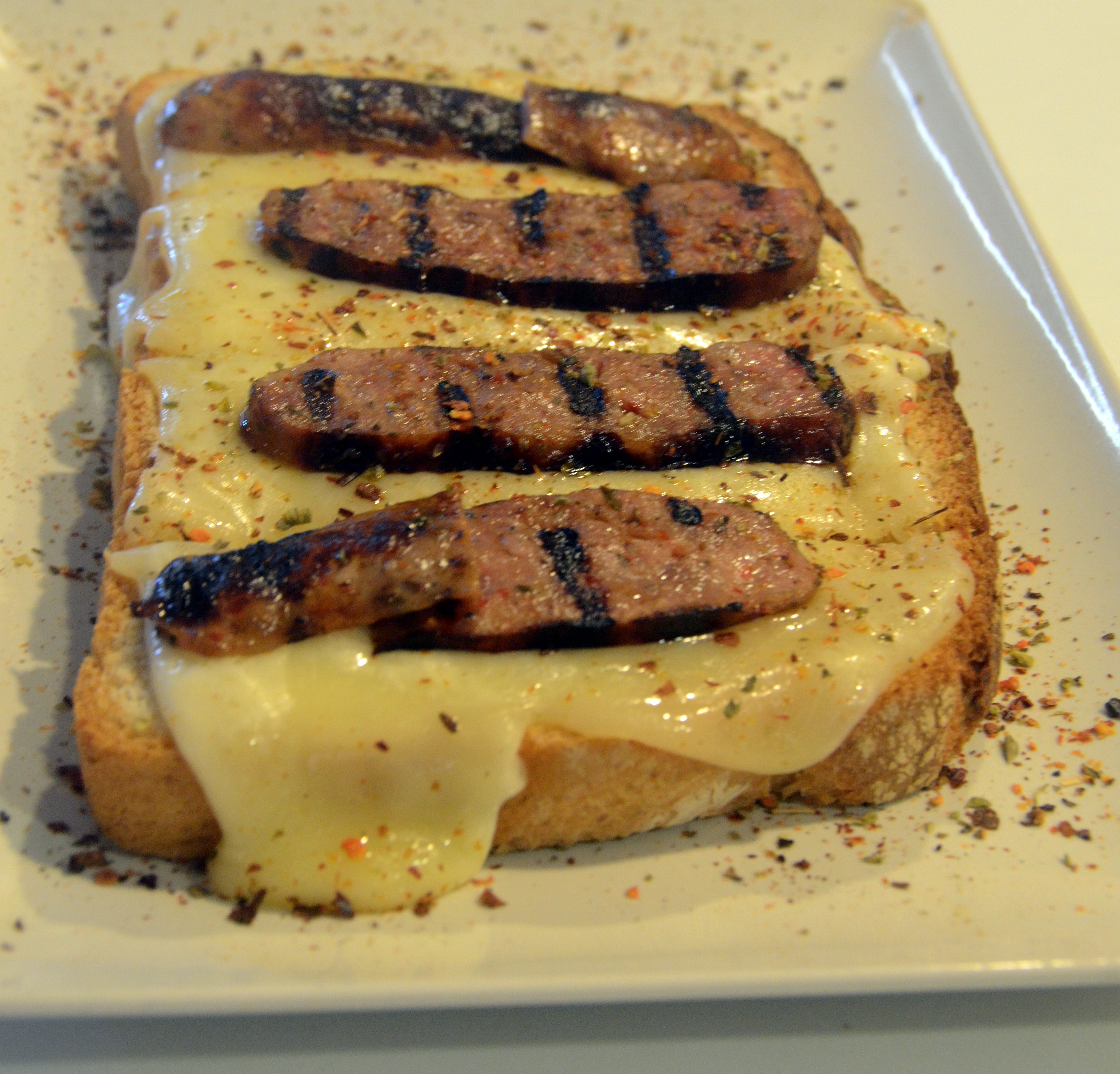 Provolone cheese with creole sausage