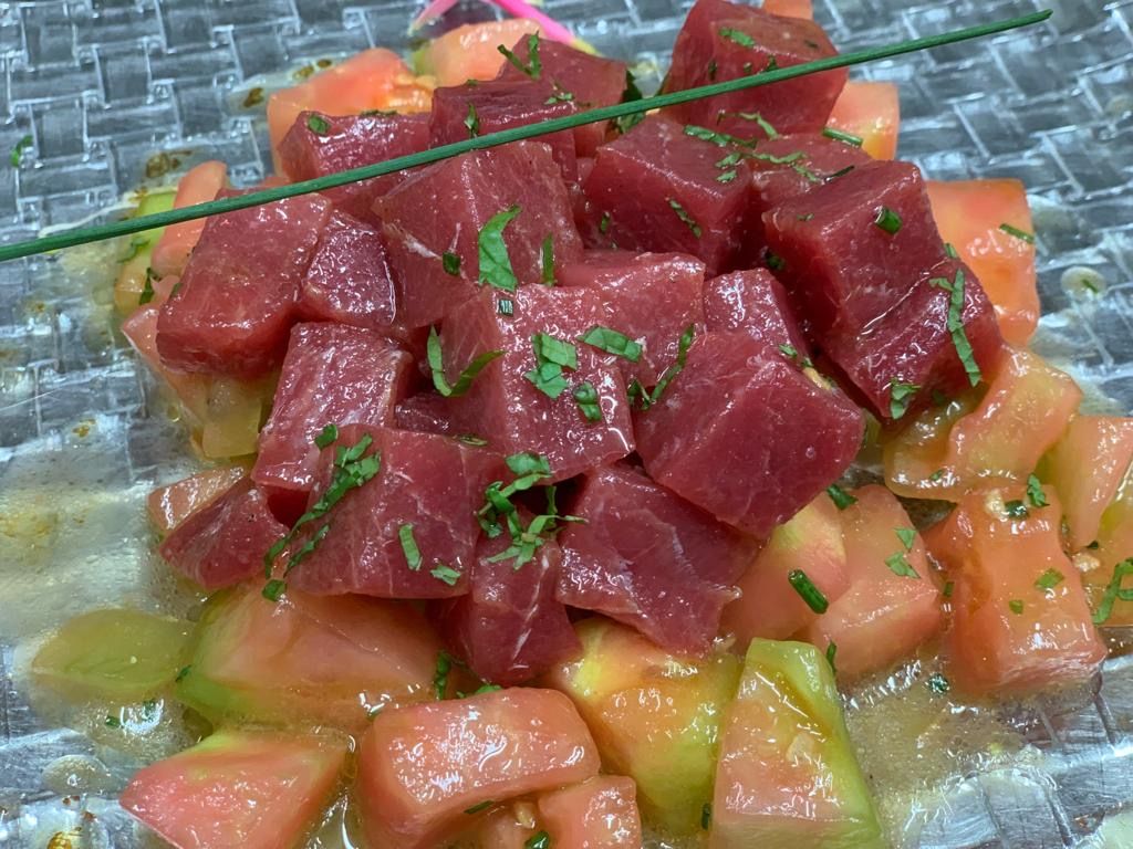 Tomato confit with dice red tuna marinated in truffle and mint