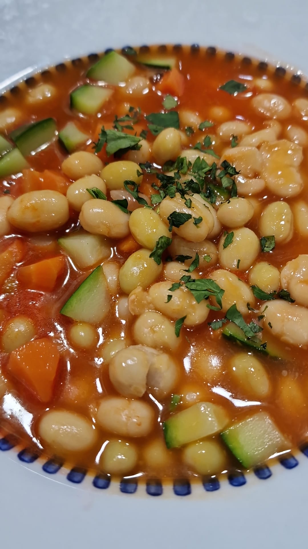 Baked beans with carrots and zucchini