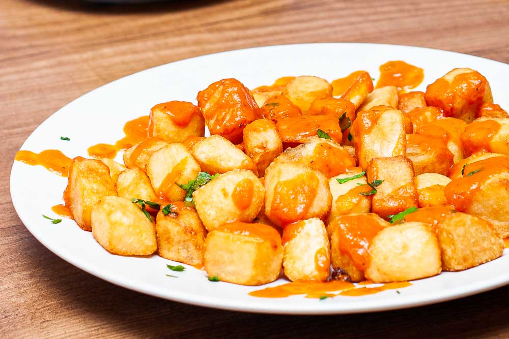 Patates amb salsa picant