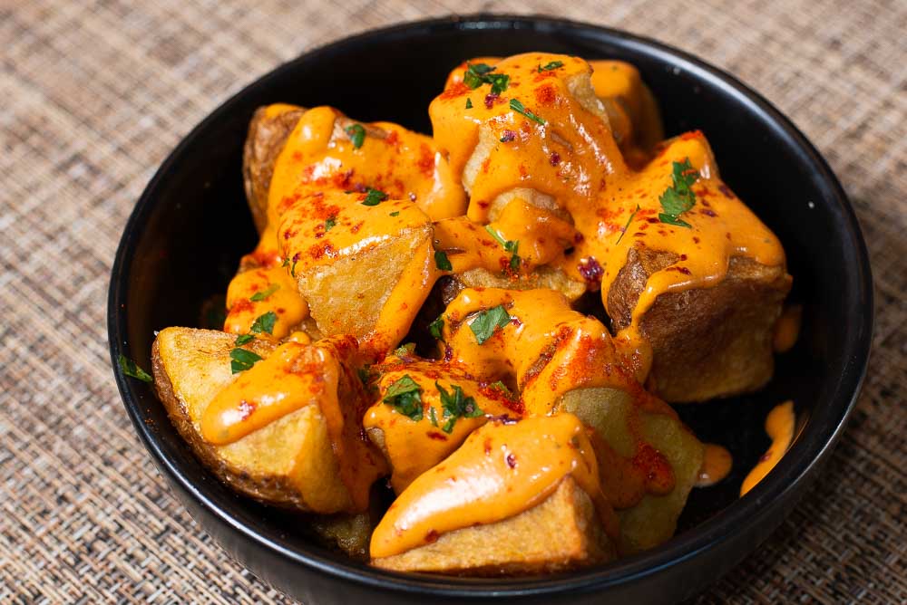 Potatoes with hot sauce