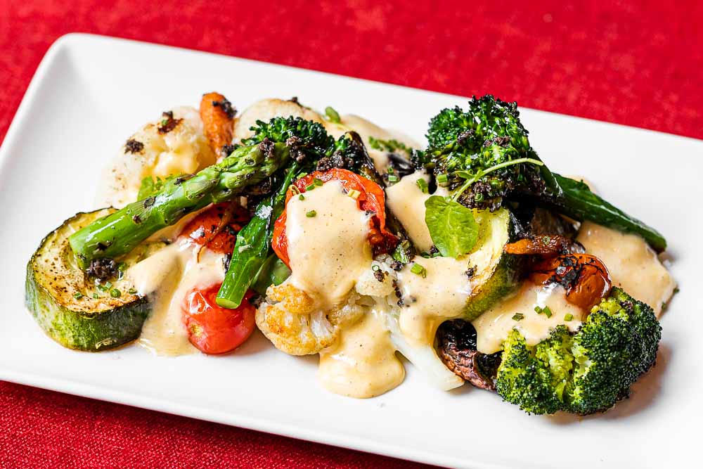 Grilled fresh vegetables with spiced hollandaise sauce